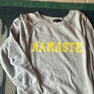 Grey J. crew crew neck with yellow “namaste”